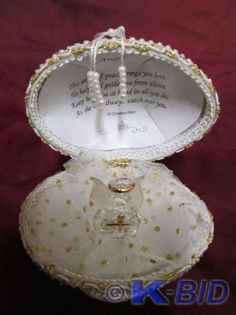 lot 72 image: Hand sculpted angel of peace in pea...