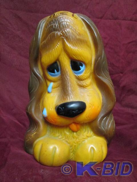 lot 111 image: Vintage sad dog coin bank.
