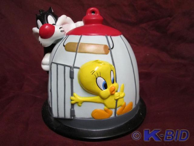 lot 114 image: Sylvester and Tweetie Bird coin ban...