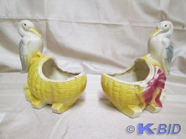 lot 29 image: Vintaqe stork and cradle porcelain ...