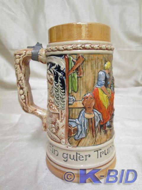 lot 34 image: liter German stein. Flip top lid ap...