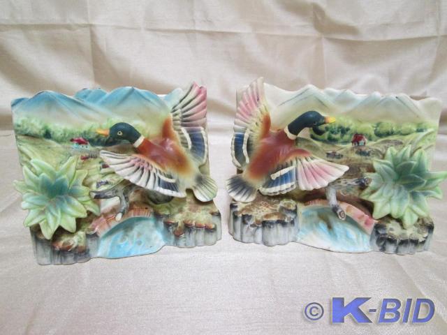lot 40 image: Vintage porcelain book ends with st...