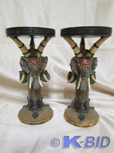 lot 71 image: African elephant pillar candle hold...
