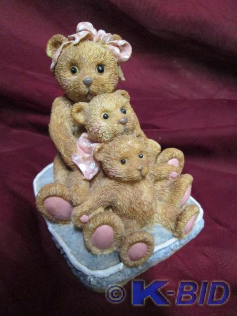 lot 86 image: Berry Hill Bears statue. Three litt...