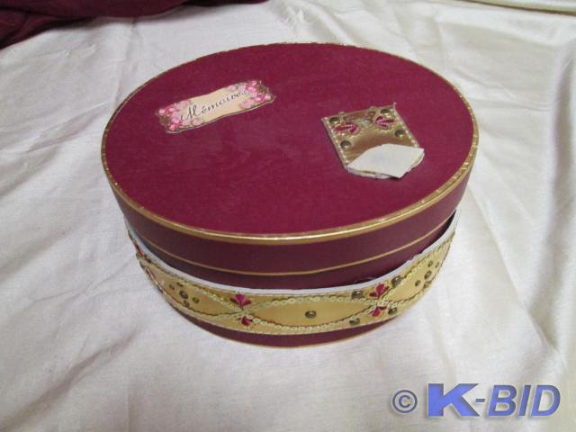 lot 97 image: Red oval memory box. Very nice