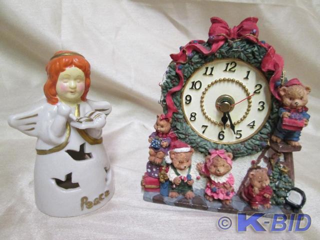 lot 99 image: Wreath clock with a family of bears...