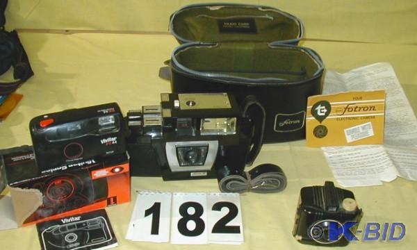 lot 182 image: Three Vintage Film Cameras  The lar...