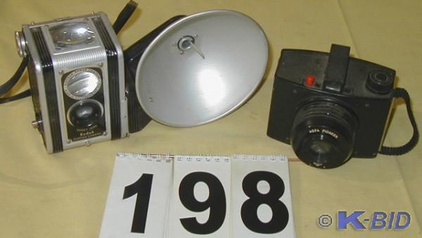 lot 198 image: Two Vintage Film Cameras  On the le...