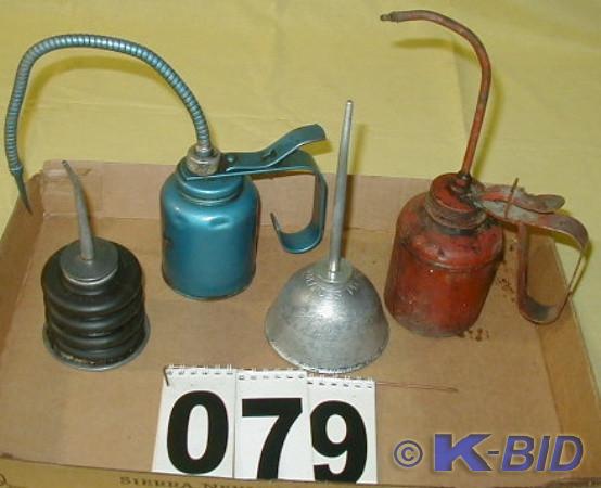 lot 79 image: Four Vintage Oil Can Oilers  There ...