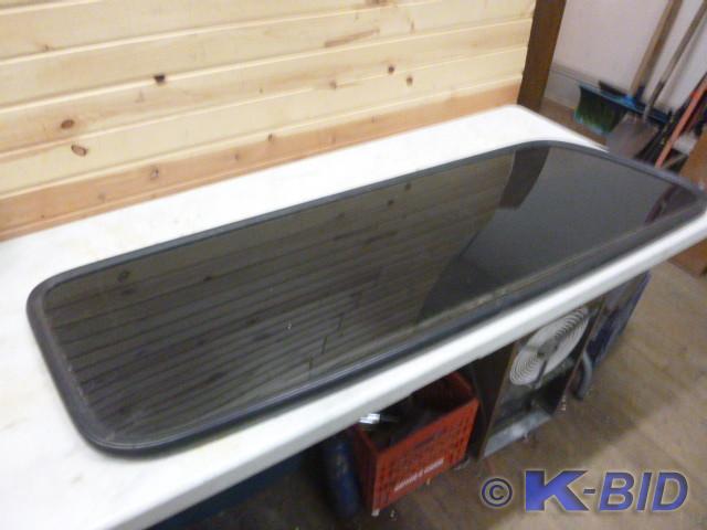 lot 119 image: Side Window from Older Chevy Blazer