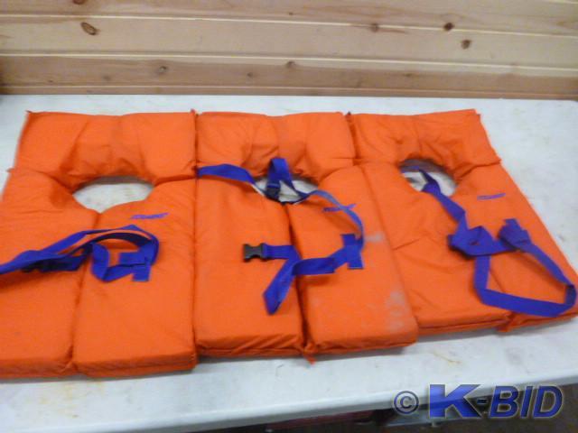lot 99 image: 3 Stearns Life Vests   Adult Sizes ...