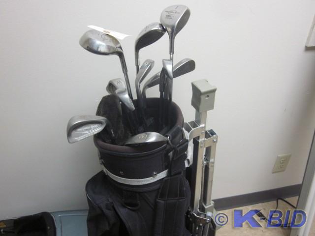Wilson golf bag and cart, cart is m...
