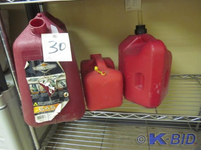 Lot of (3) plastic gas cans, (1) wi...