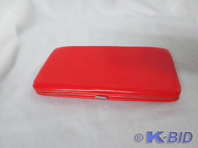 Red Wallet   Has slight rip in the ...