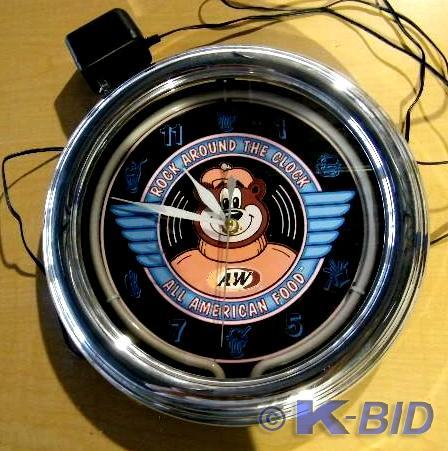 lot 29 image: A & W Clock    Says Rock Aroun...