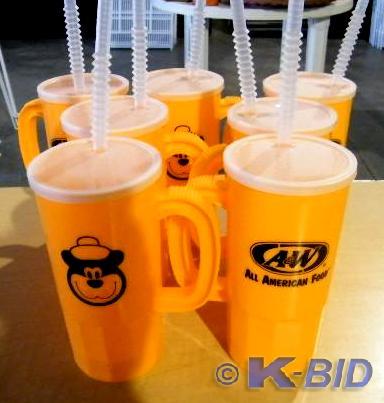 lot 33 image: Lot of 7 Orange Plastic A & W M...