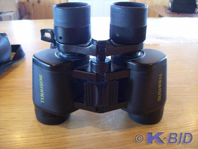 lot 17 image: Bushnell Binoculars  -Comes wi...