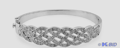 lot 30 image: Stunning 14 CTTW Diamond Bangle Rh...
